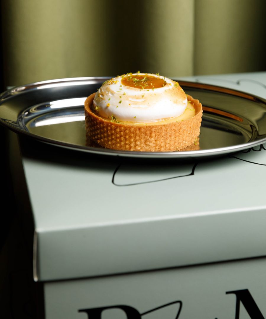 Lemon tart dessert on silver tray